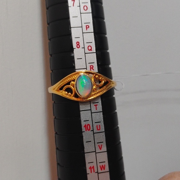 Gold Ring with Welo Opal Stone